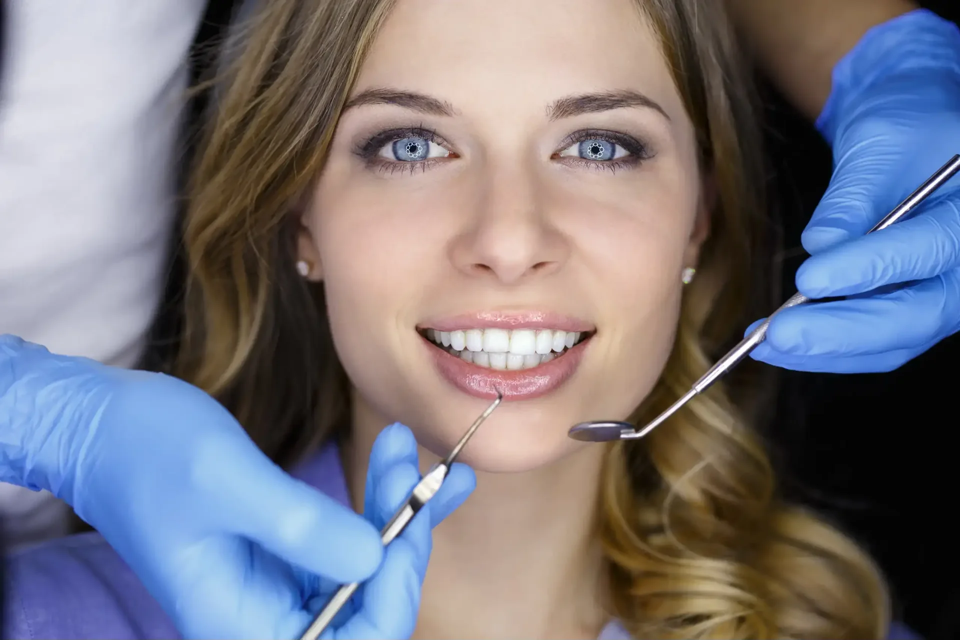 Dentist performing a routine dental examination